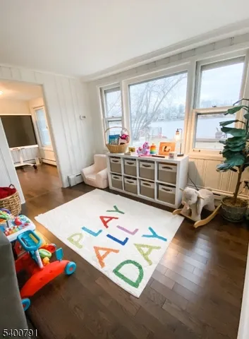 a bed room with furniture and a window