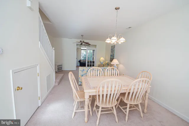a view of a hallway with windows