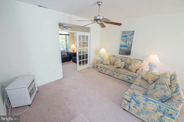 a view of a hallway with a white walls