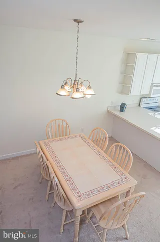 a spacious bathroom with a double vanity sink a mirror and a bathtub
