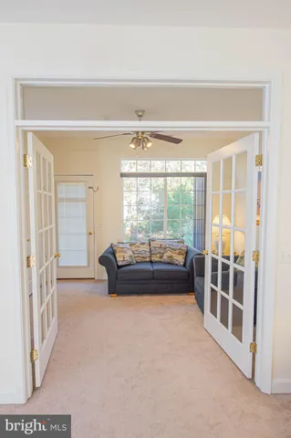 a bathroom with a sink a toilet and shower curtain