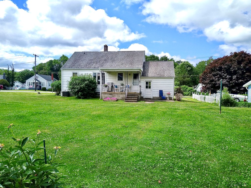 191 Baker Street Rimersburg, PA 16248 - Photo 13 of 13 a front view of a house with garden and trees