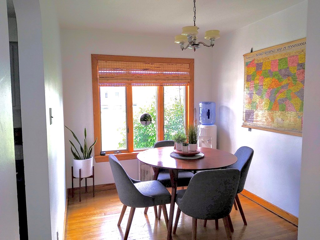 191 Baker Street Rimersburg, PA 16248 - Photo 5 of 13 a dining room with furniture a chandelier and wooden floor
