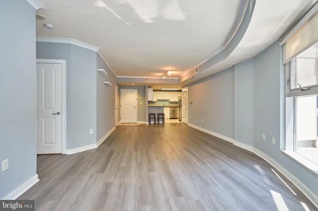 a view of a livingroom with wooden floor
