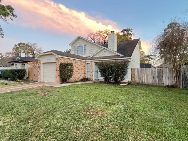 a view of a back yard of the house