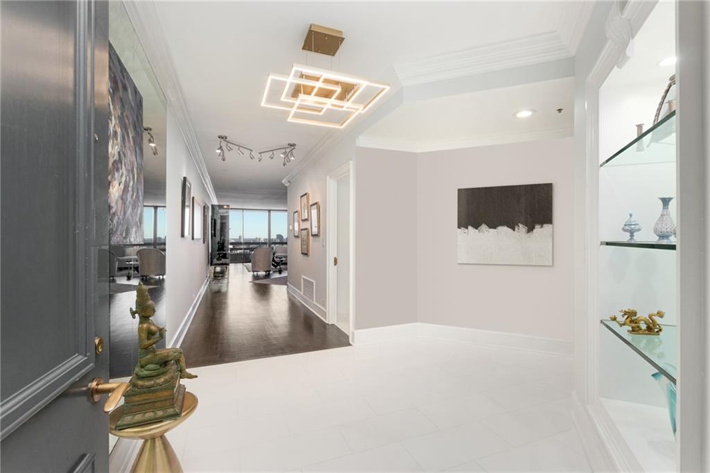 2660 Peachtree Road Northwest, Unit 38F Atlanta, GA 30305 - Photo 1 of 1 a view of a hallway with workspace