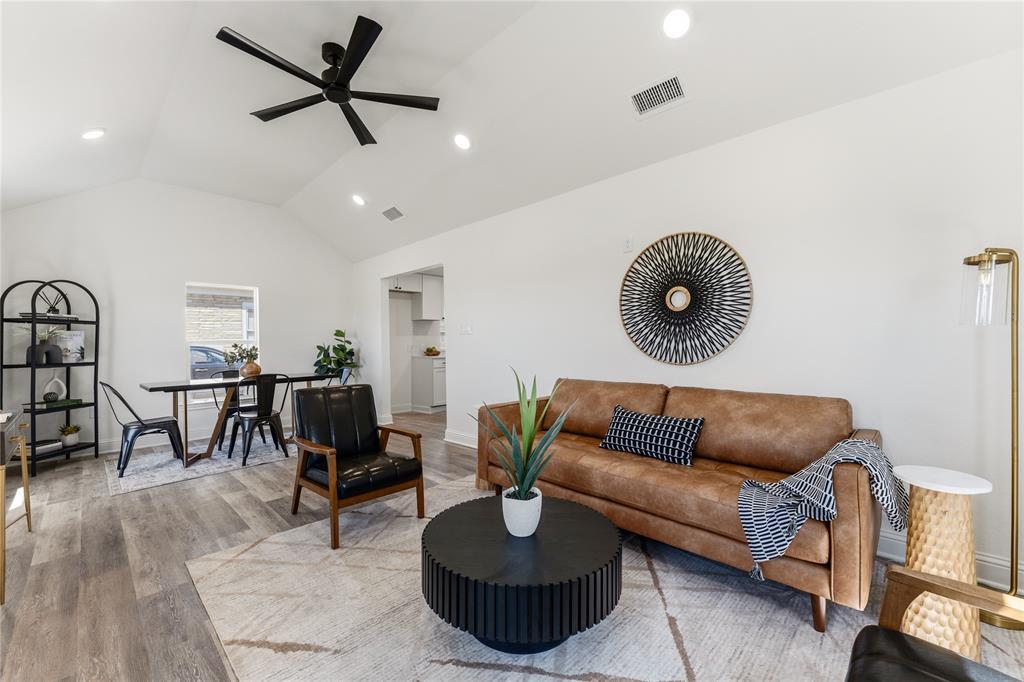 815 Garrison Street Waco, TX 76704 - Photo 7 of 36 a living room with furniture and a wooden floor