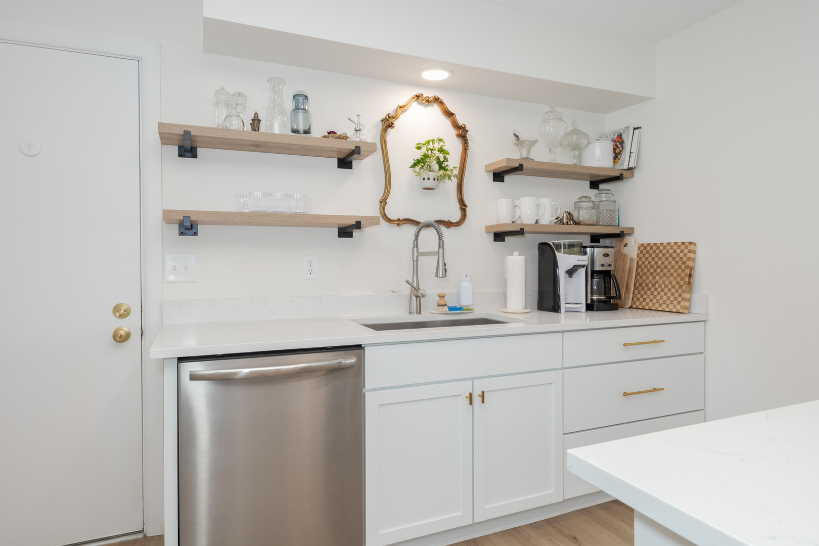 1805 Widermere Drive Normal, IL 61761 - Photo 13 of 46 a room with kitchen island a sink and wooden floor