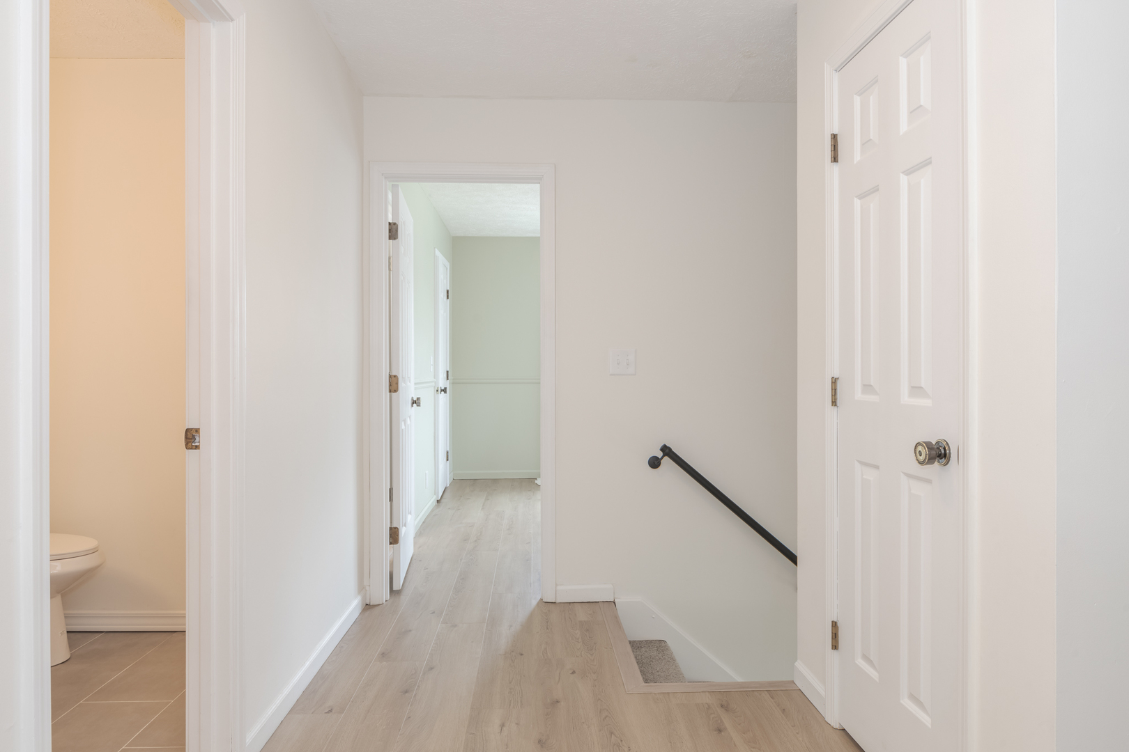 1805 Widermere Drive Normal, IL 61761 - Photo 21 of 46 a view of a bathroom from a hallway