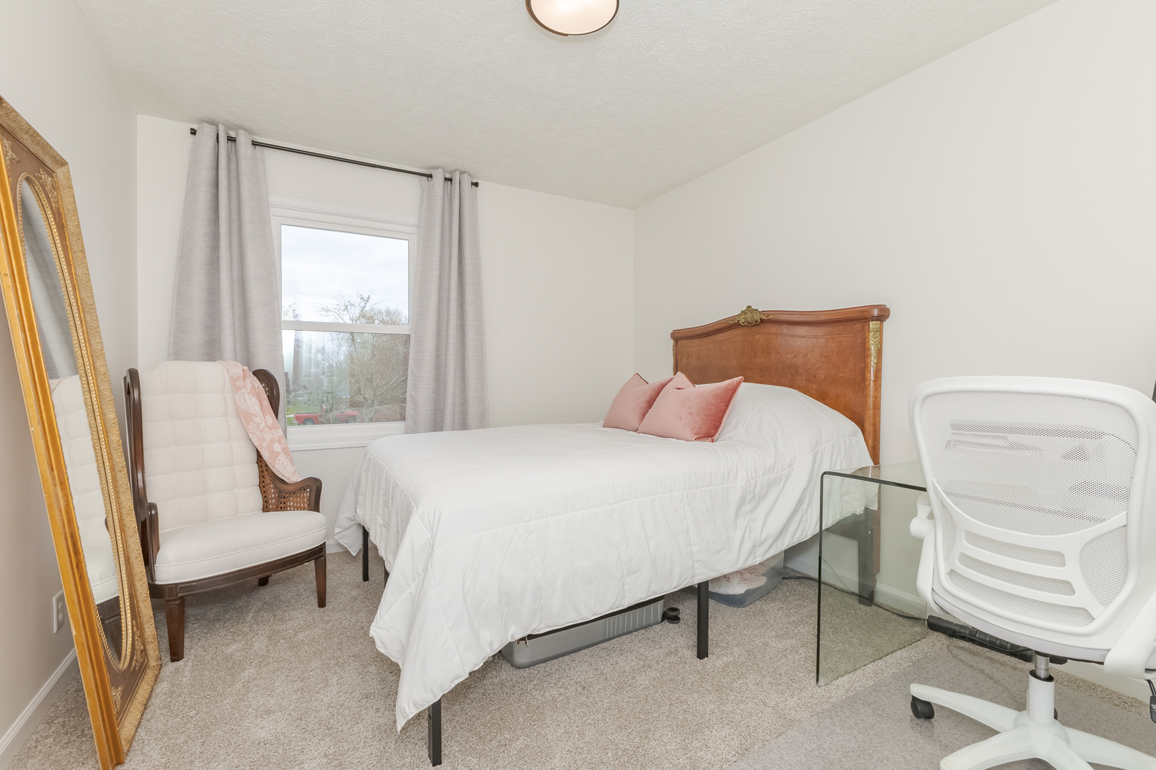 1805 Widermere Drive Normal, IL 61761 - Photo 29 of 46 a bedroom with a bed and a window