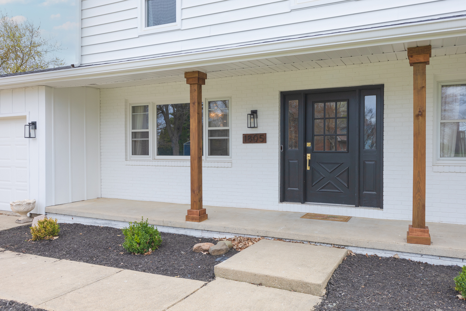 1805 Widermere Drive Normal, IL 61761 - Photo 3 of 46 a front view of a house