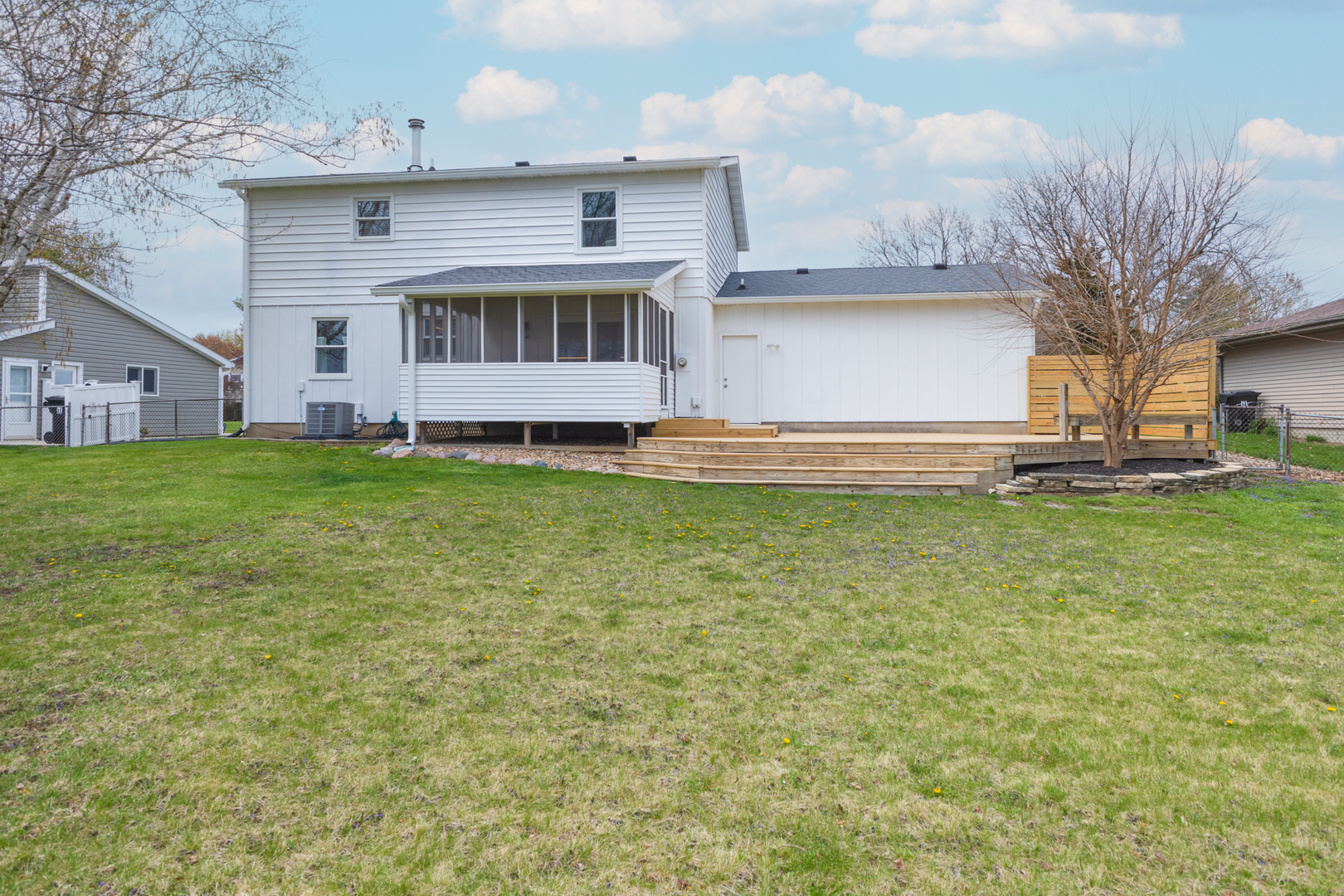 1805 Widermere Drive Normal, IL 61761 - Photo 38 of 46 a view of a backyard with plants and large tree