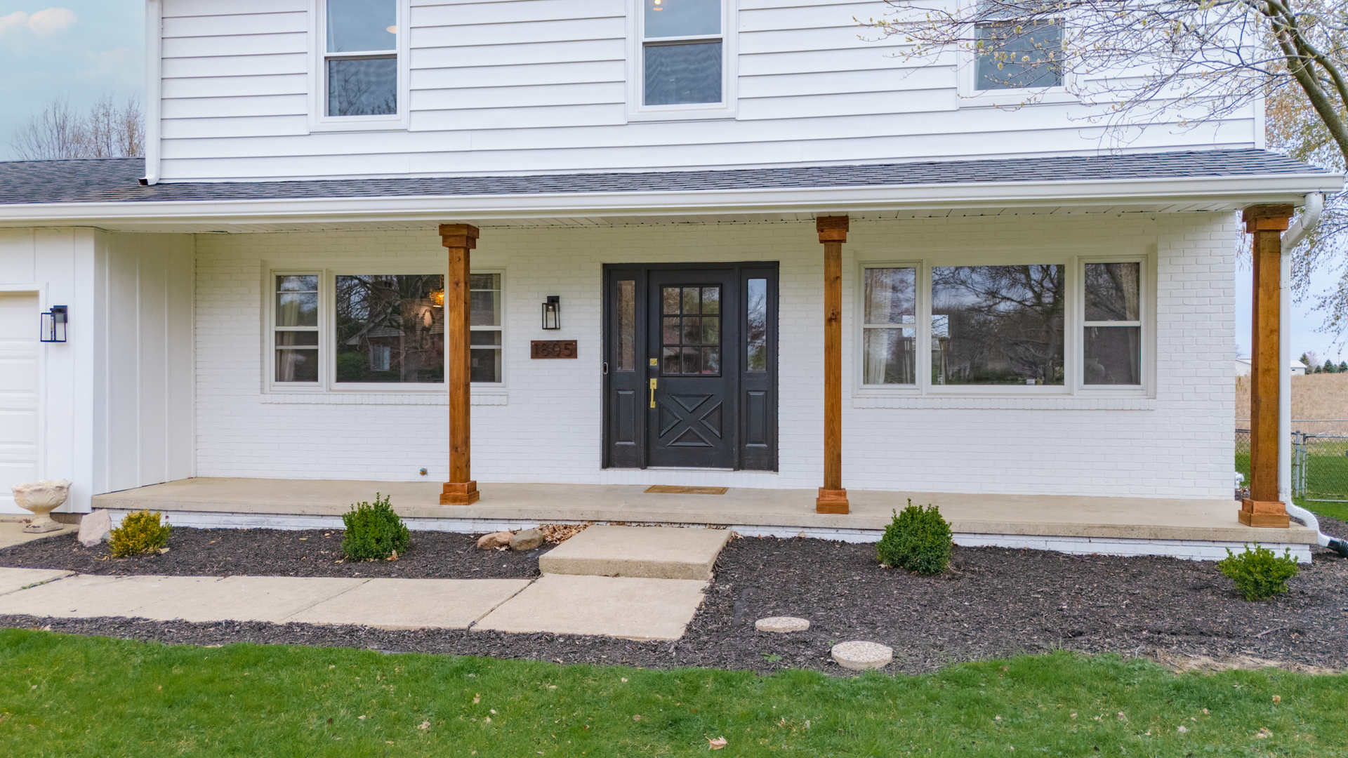 1805 Widermere Drive Normal, IL 61761 - Photo 45 of 46 a front view of a house with a yard and garage