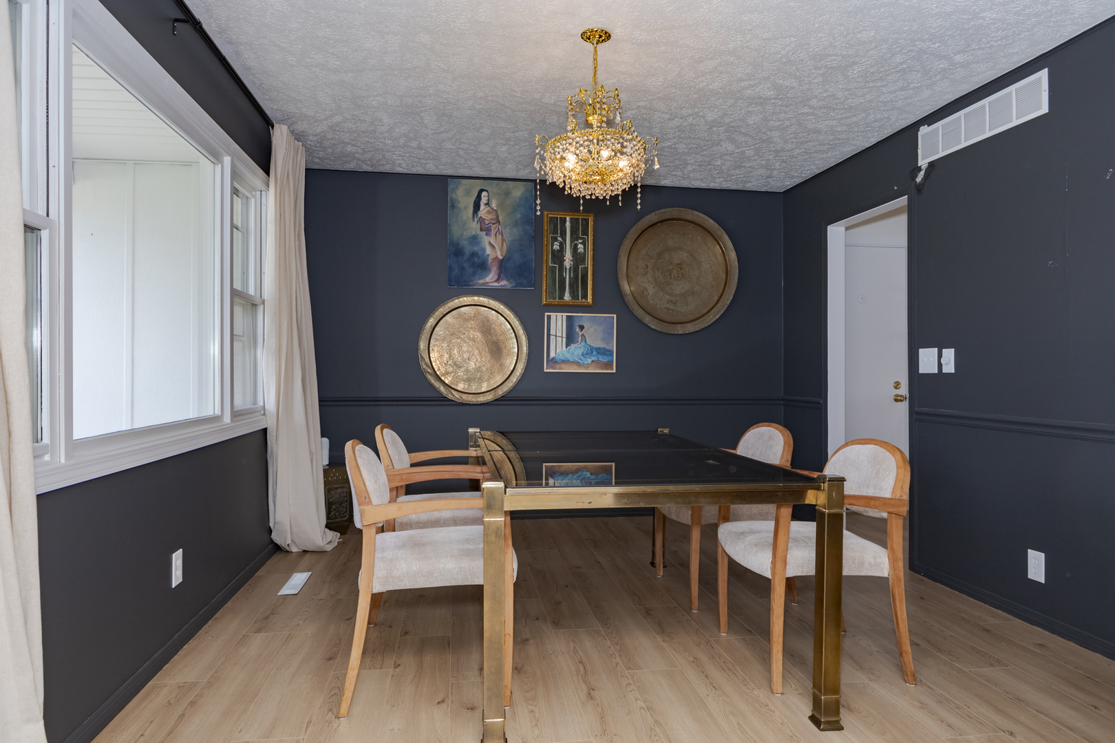 1805 Widermere Drive Normal, IL 61761 - Photo 8 of 46 a view of a dining room with furniture and chandelier