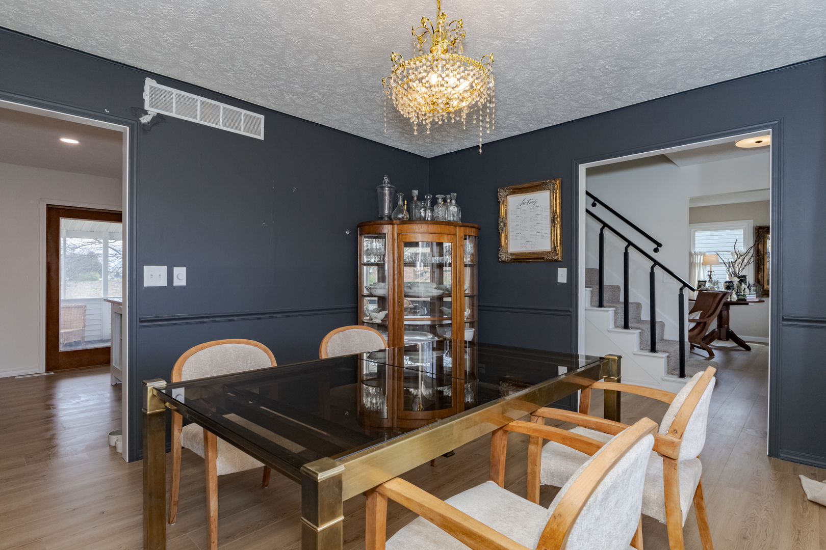 1805 Widermere Drive Normal, IL 61761 - Photo 9 of 46 a view of a dining room with furniture wooden floor and chandelier