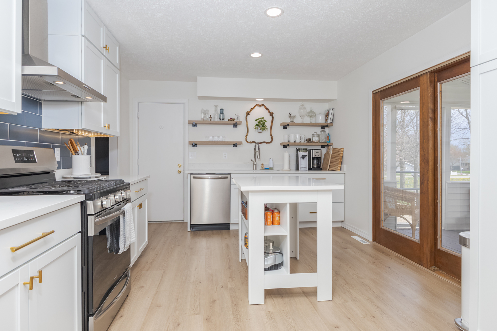 1805 Widermere Drive Normal, IL 61761 - Photo 10 of 46 a kitchen with stainless steel appliances granite countertop a stove and a sink