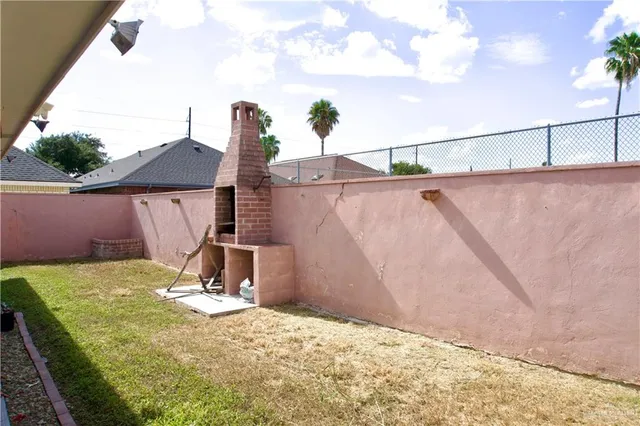 a view of outdoor space with barbeque and outdoor seating