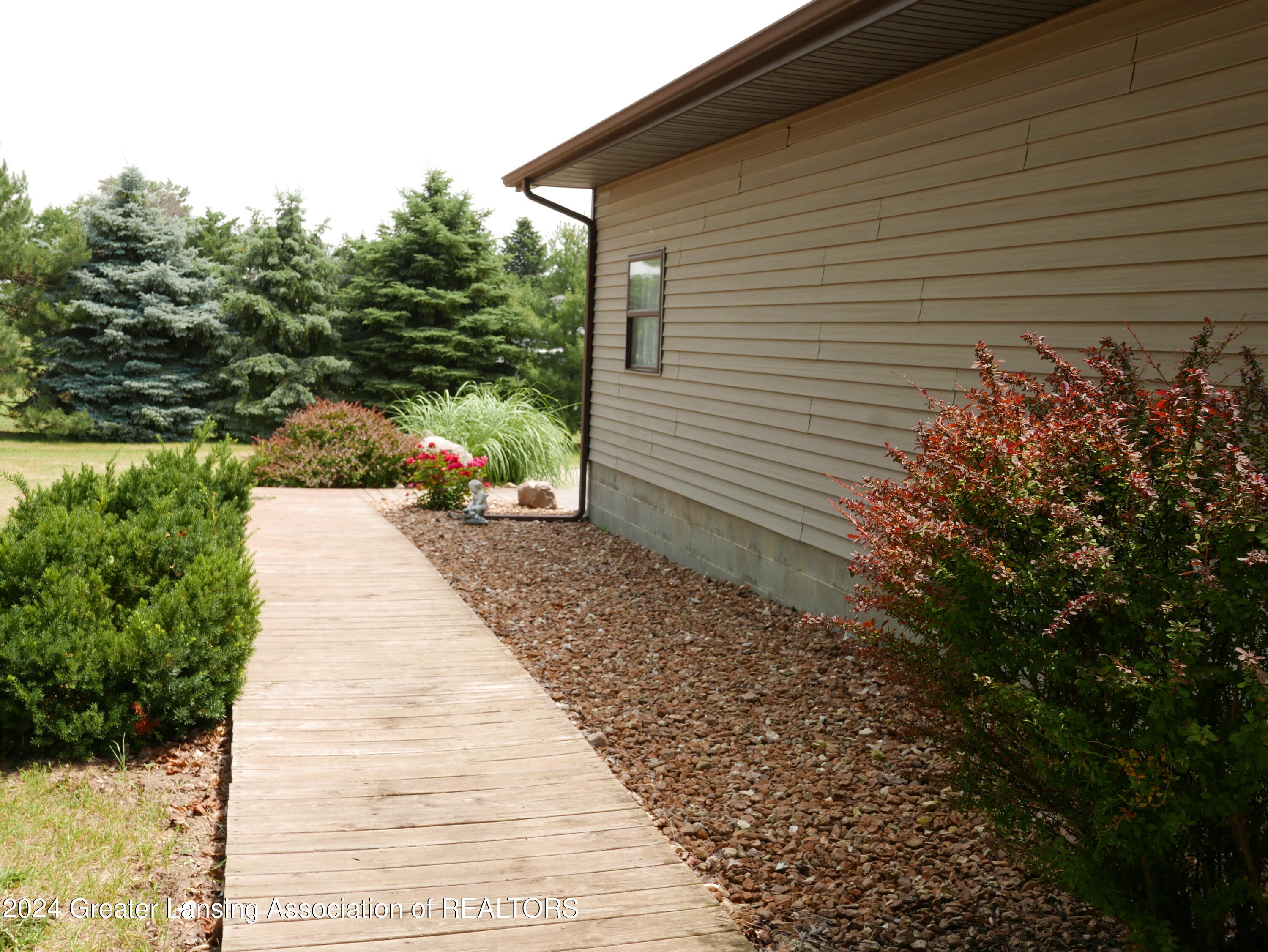 2804 West Kinley Road St. Johns, MI 48879 - Photo 56 of 59 Walkway along Garage
