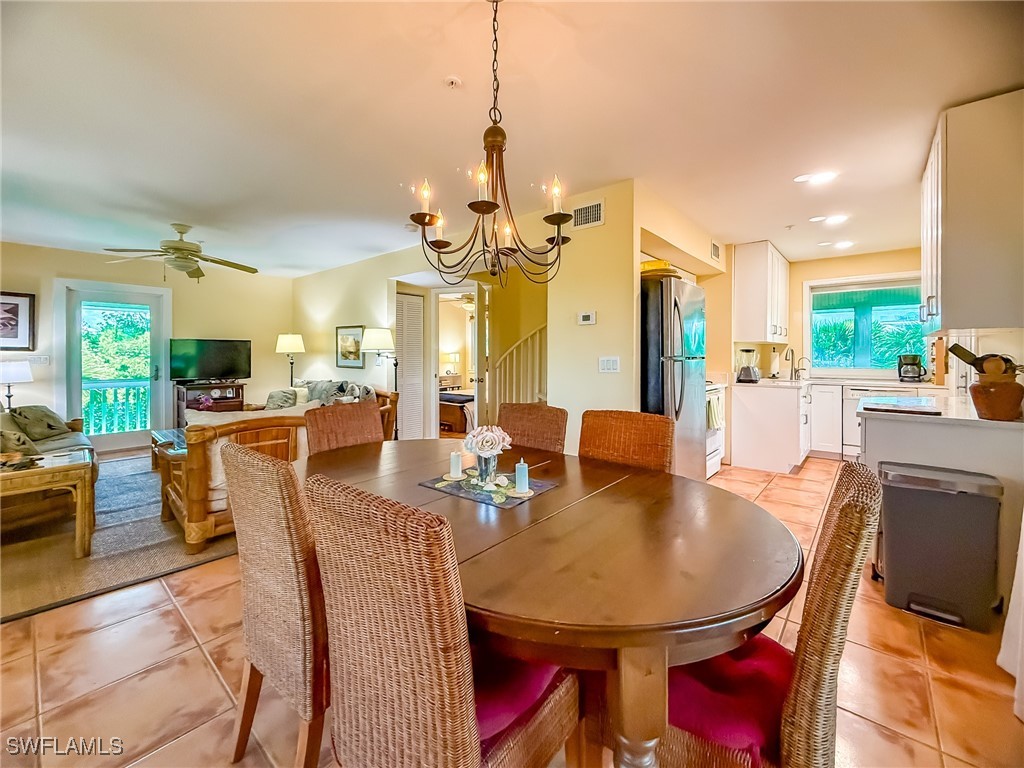 4511 Conch Shell Drive Upper Captiva, FL 33924 - Photo 14 of 50 a view of a dining room with furniture