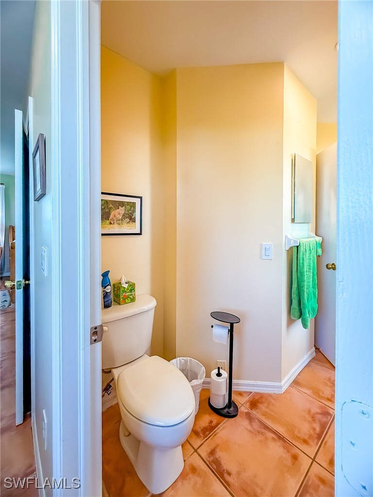 4511 Conch Shell Drive Upper Captiva, FL 33924 - Photo 19 of 50 a bathroom with a toilet and a shower