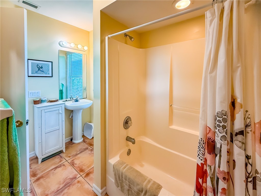 4511 Conch Shell Drive Upper Captiva, FL 33924 - Photo 22 of 50 a bathroom with a sink a toilet and a bathtub