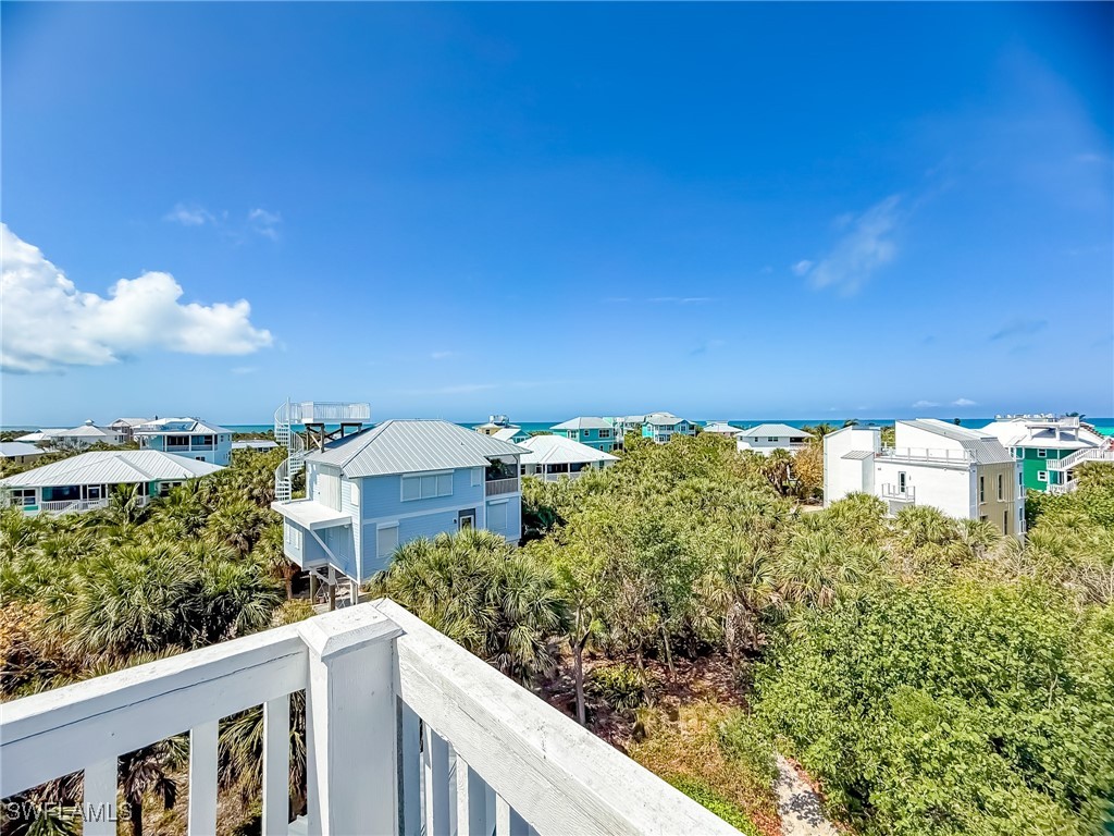 4511 Conch Shell Drive Upper Captiva, FL 33924 - Photo 36 of 50 view of a city from a balcony