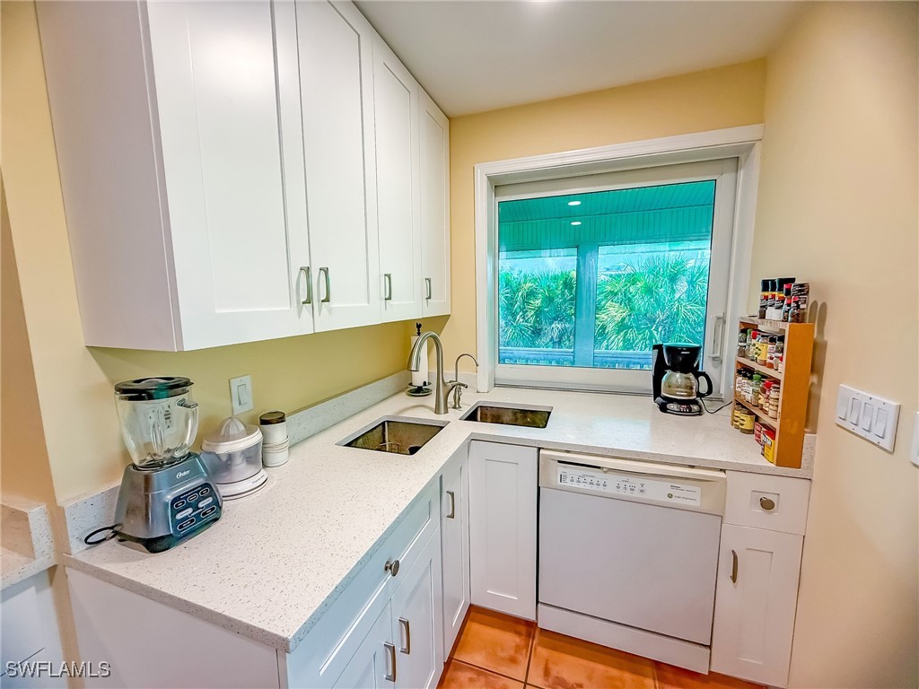 4511 Conch Shell Drive Upper Captiva, FL 33924 - Photo 8 of 50 a room with storage and utility