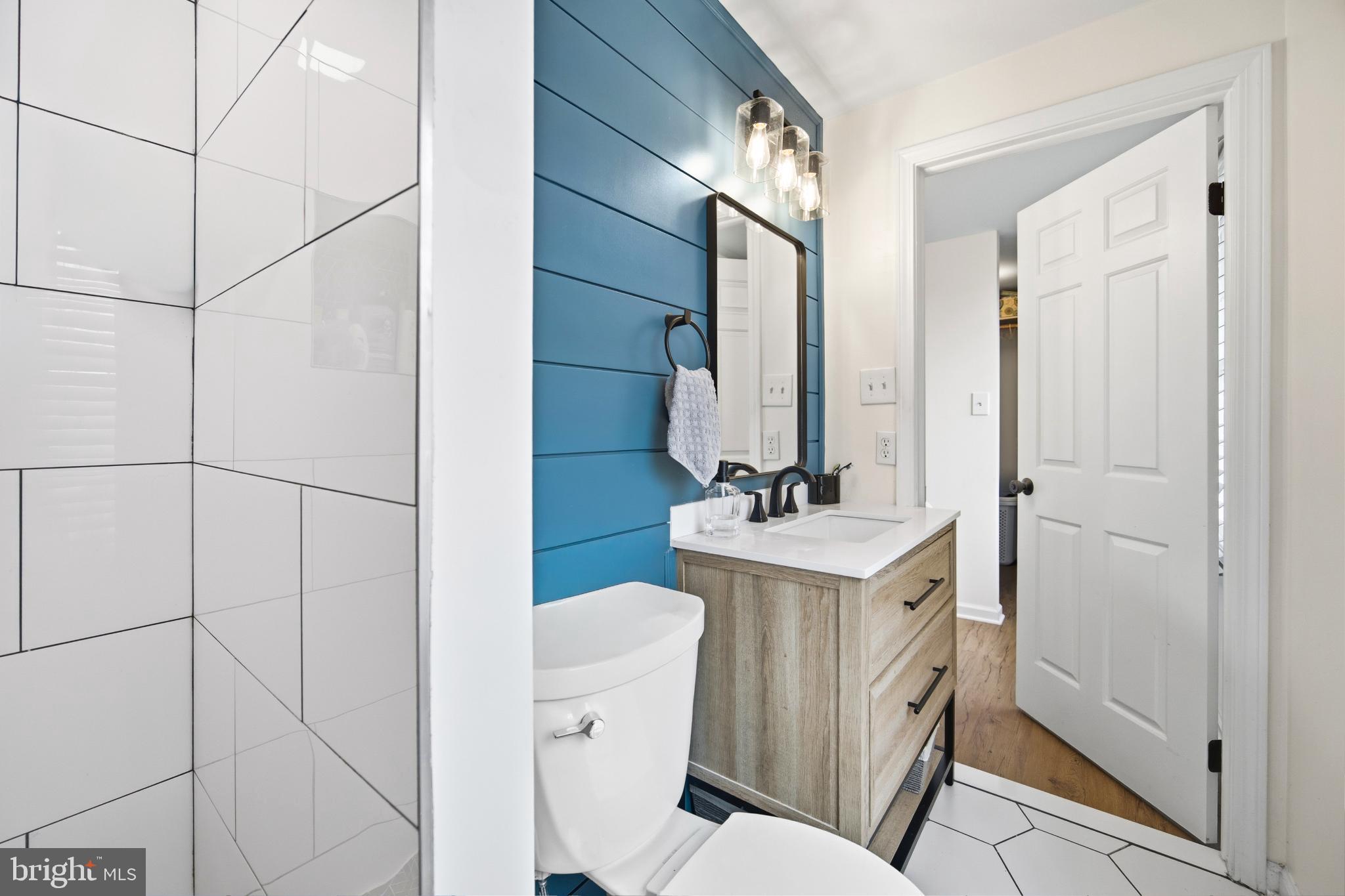 1811 Rustic Hill Court Frederick, MD 21702 - Photo 19 of 48 a bathroom with a sink toilet and shower