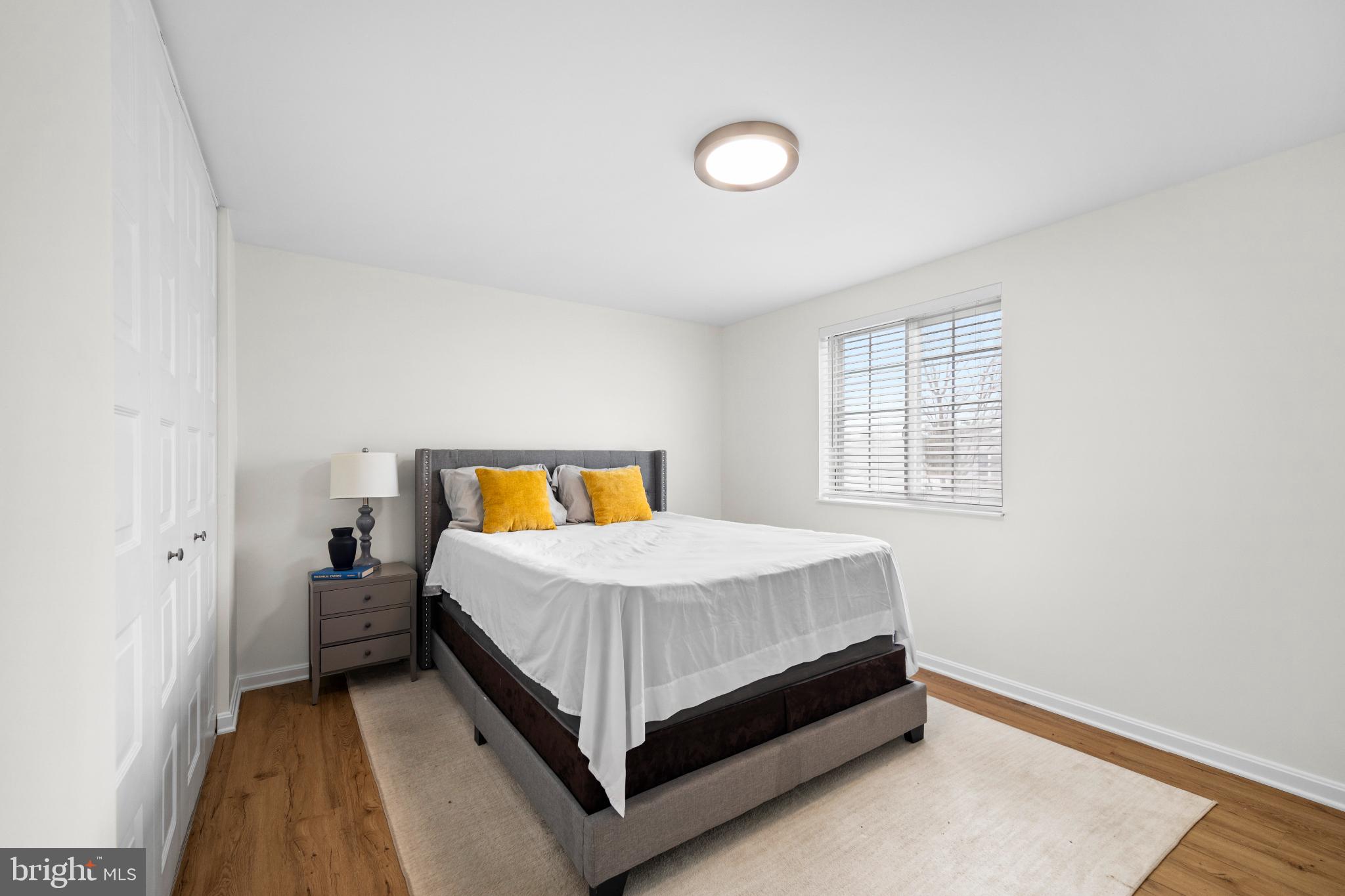 1811 Rustic Hill Court Frederick, MD 21702 - Photo 21 of 48 a bedroom with a bed and window