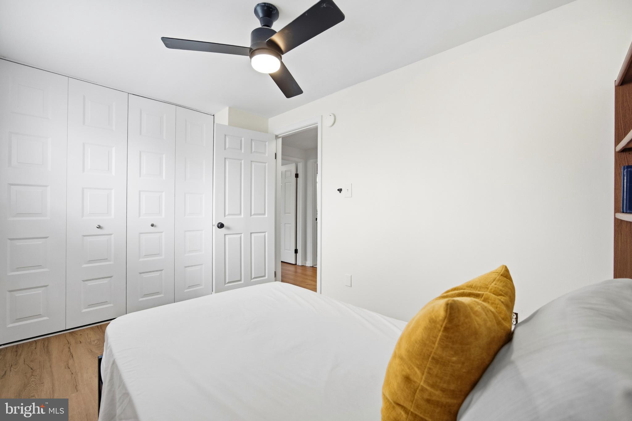 1811 Rustic Hill Court Frederick, MD 21702 - Photo 27 of 48 a bedroom with a bed and a ceiling fan