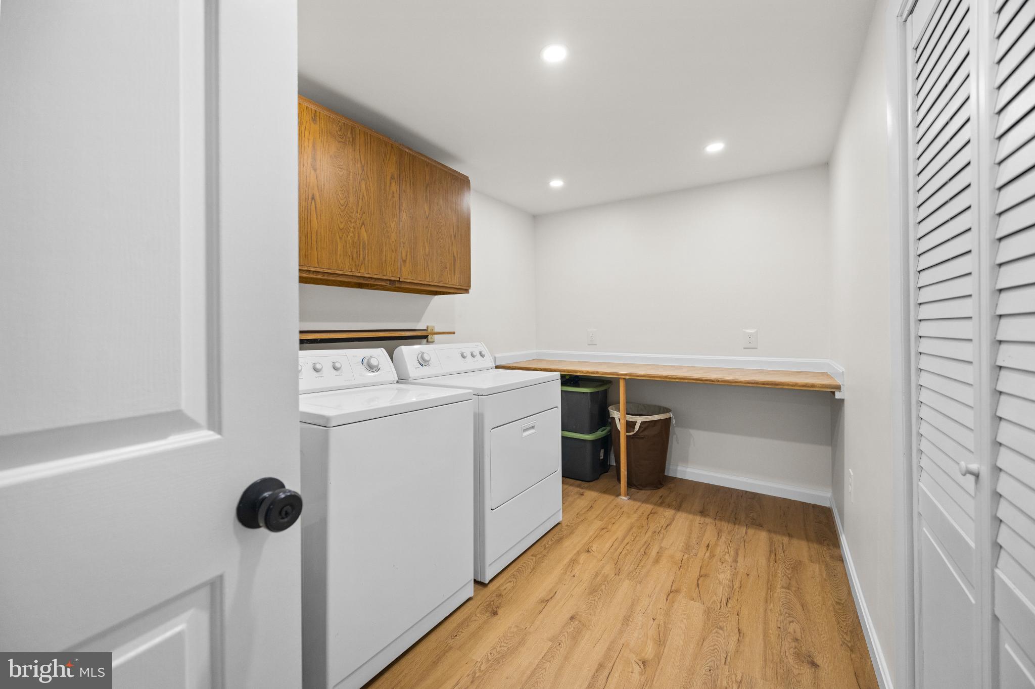 1811 Rustic Hill Court Frederick, MD 21702 - Photo 35 of 48 a room with a washer and dryer