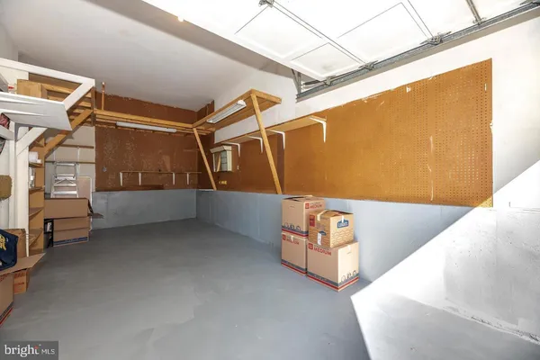 a view of an empty room with stairs