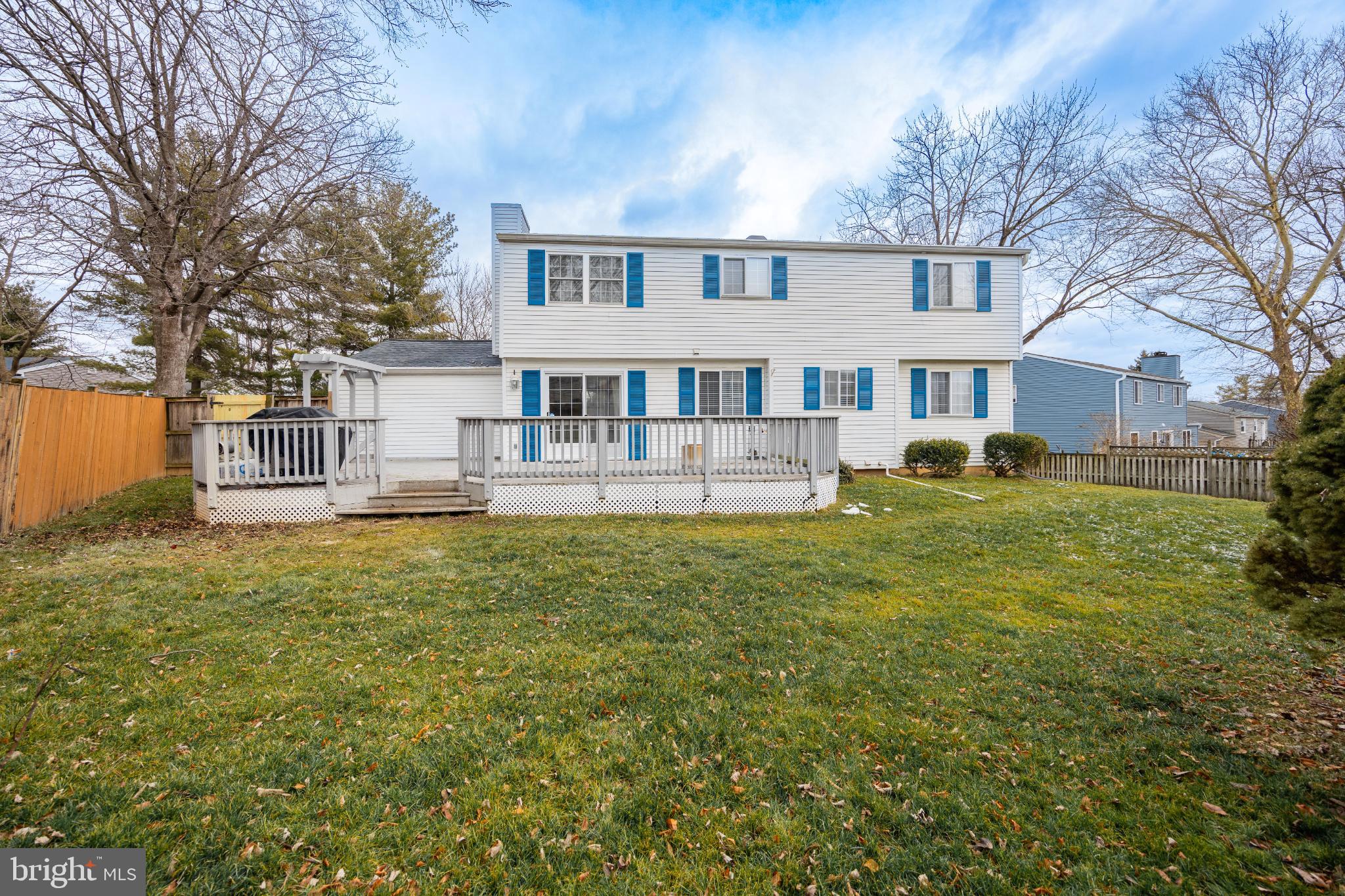 1811 Rustic Hill Court Frederick, MD 21702 - Photo 38 of 48 a front view of a house with a yard table and chairs