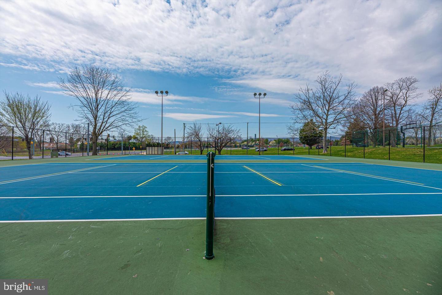 1811 Rustic Hill Court Frederick, MD 21702 - Photo 42 of 48 a view of an outdoor space and tennis court