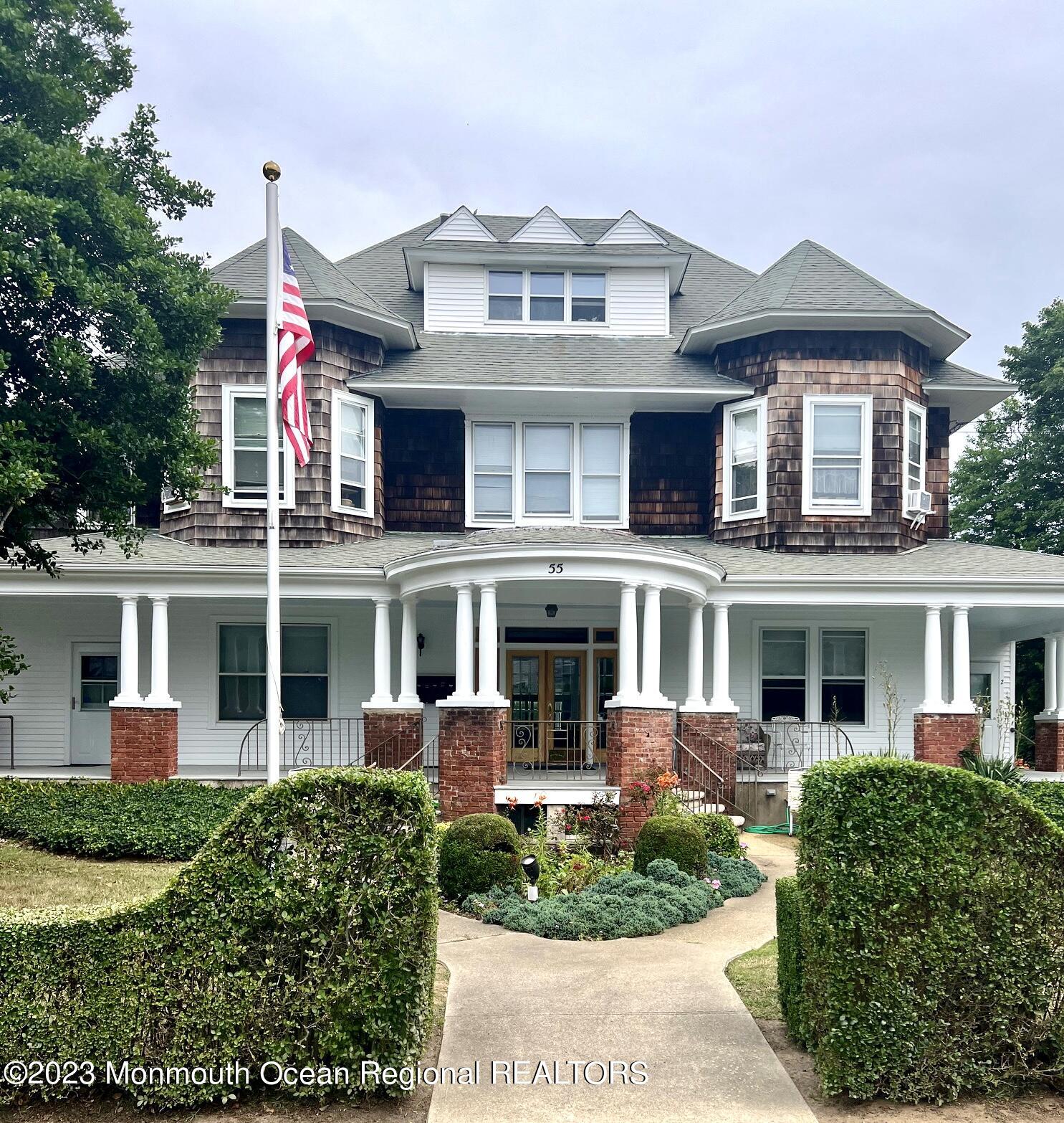 55 Matilda Terrace Long Branch, NJ 07740 - Photo 1 of 44 front view of a house with a yard
