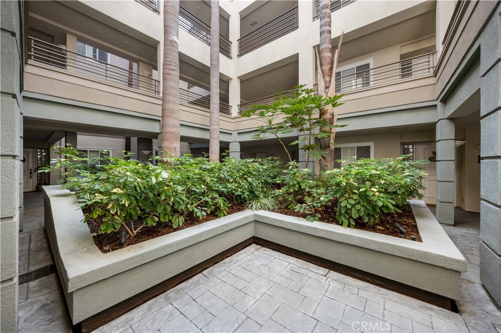 2253 Martin, Unit 106 Irvine, CA 92612 - Photo 1 of 19 a view of balcony with potted plants