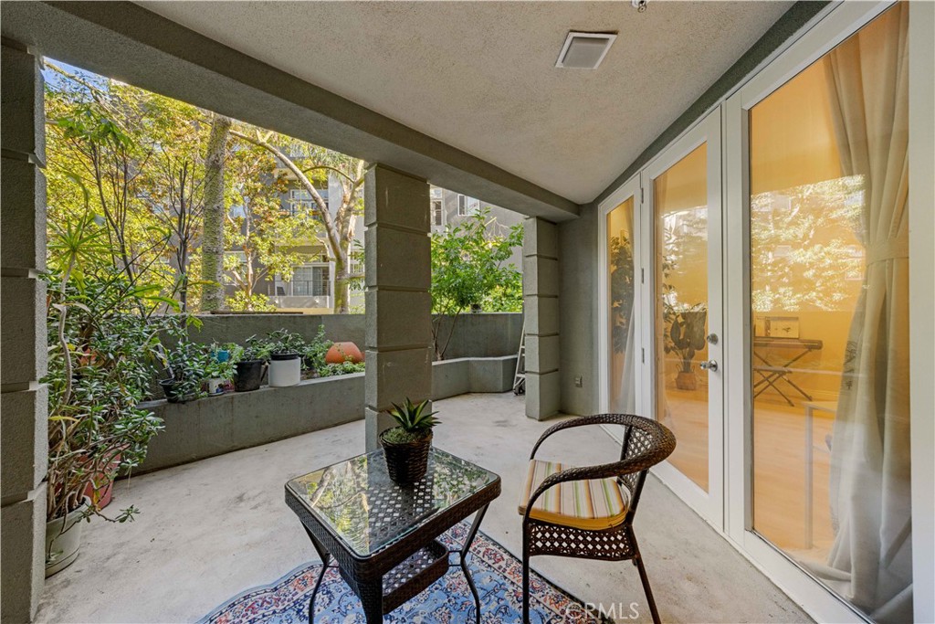 2253 Martin, Unit 106 Irvine, CA 92612 - Photo 14 of 19 a living room with furniture and a window