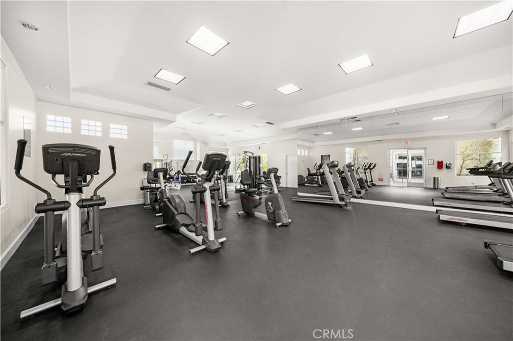 2253 Martin, Unit 106 Irvine, CA 92612 - Photo 17 of 19 a view of a room with gym equipment