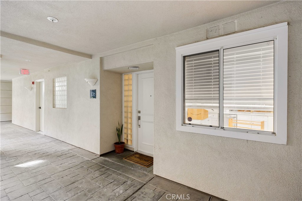 2253 Martin, Unit 106 Irvine, CA 92612 - Photo 2 of 19 a view of an empty room with a window