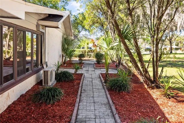 a view of a pathway with a patio
