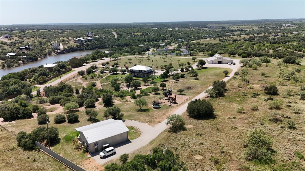 7060 Hells Gate Loop Strawn, TX 76475 - Photo 6 of 40 Bird's eye view of a large body of water