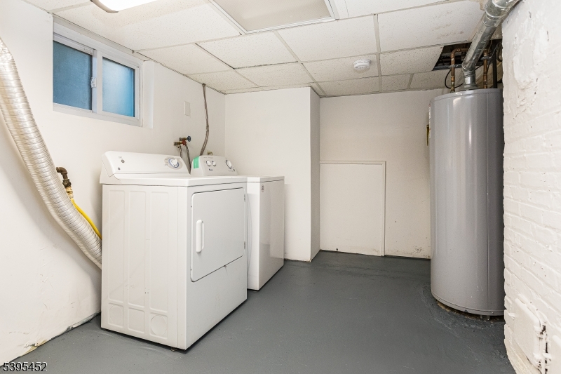 112 Pompton Avenue, Unit 1 Verona, NJ 07044 - Photo 18 of 25 a utility room with dryer and washer