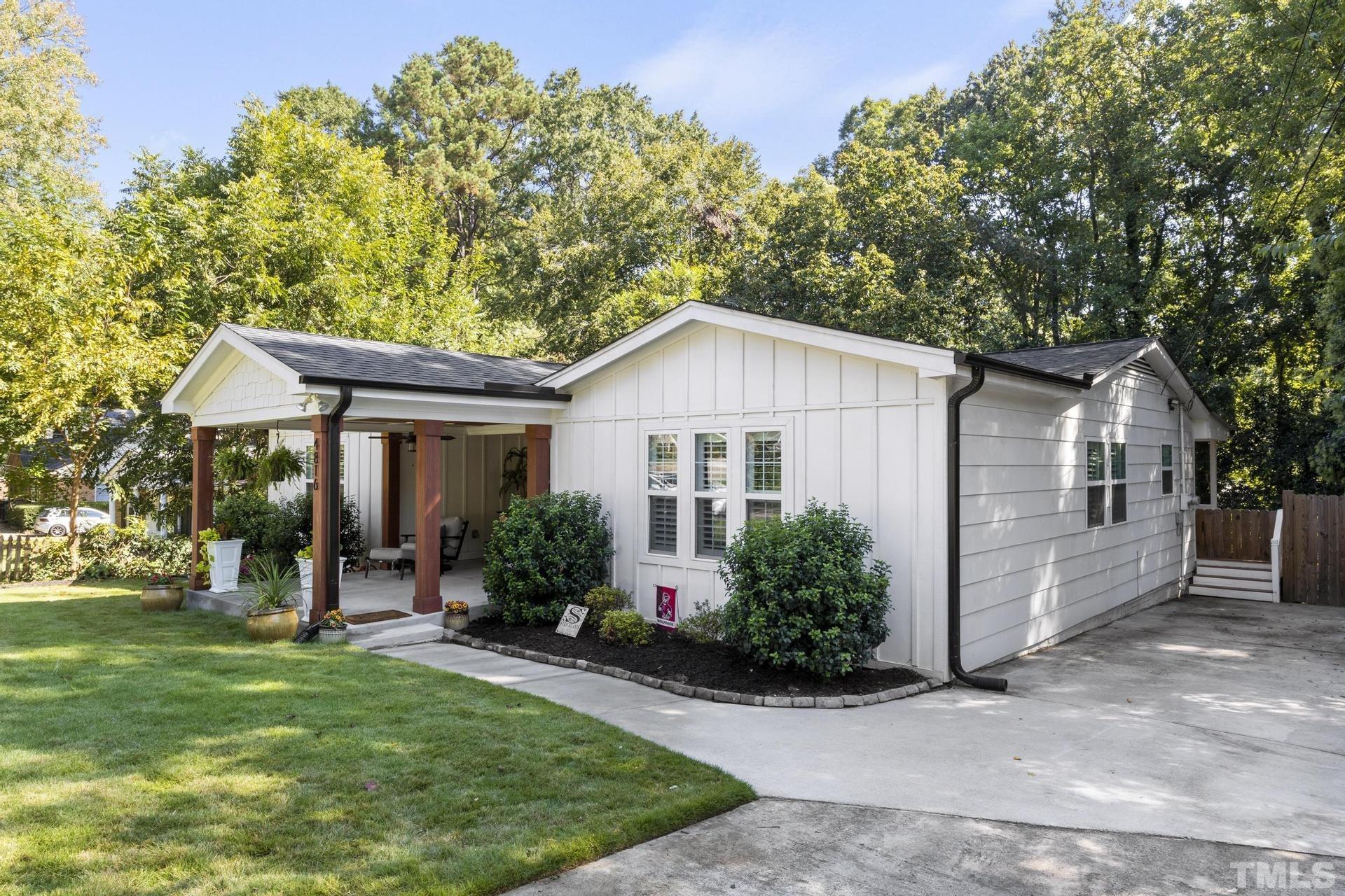 4816 Radcliff Road Raleigh, NC 27609 - Photo 2 of 52 front view of a house with a yard