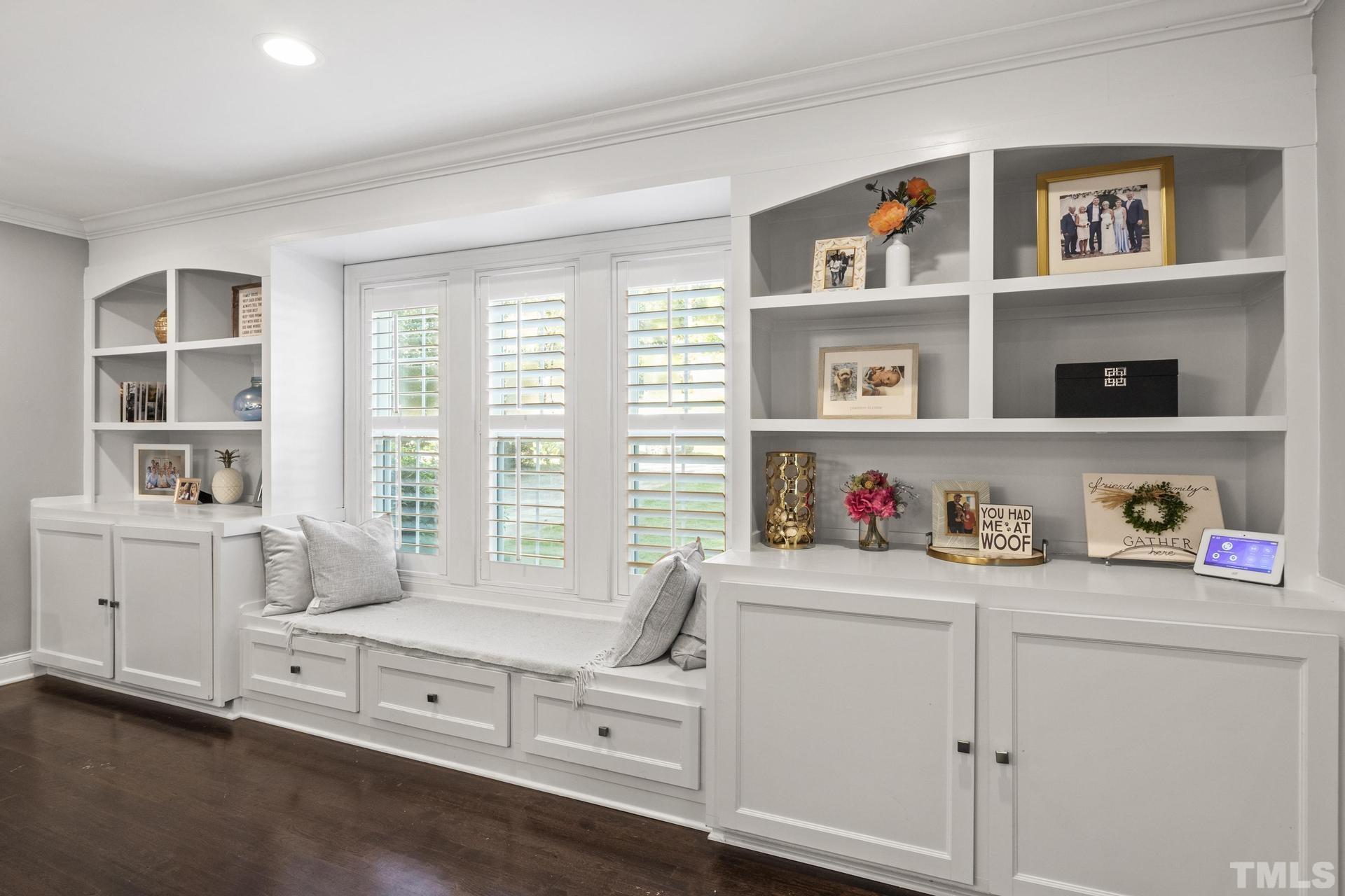 4816 Radcliff Road Raleigh, NC 27609 - Photo 6 of 52 a room with furniture a baby crib and a window
