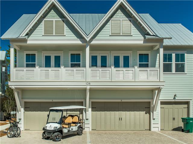 138 East E Pine, Unit A Inlet Beach, FL 32461 - Photo 1 of 48 a front view of a house with lots of windows