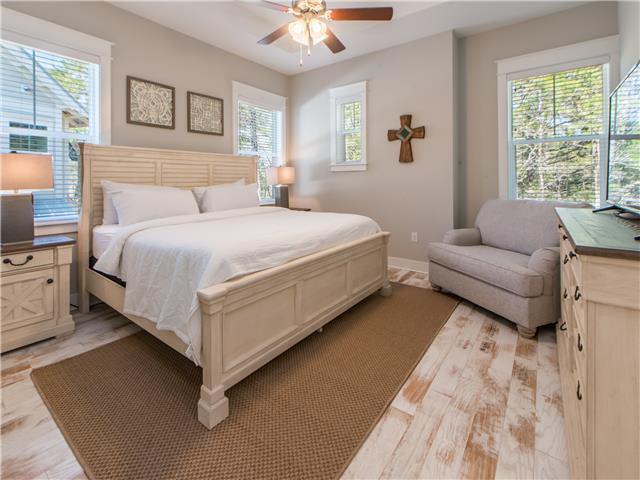 138 East E Pine, Unit A Inlet Beach, FL 32461 - Photo 19 of 48 a bedroom with bed couch and window
