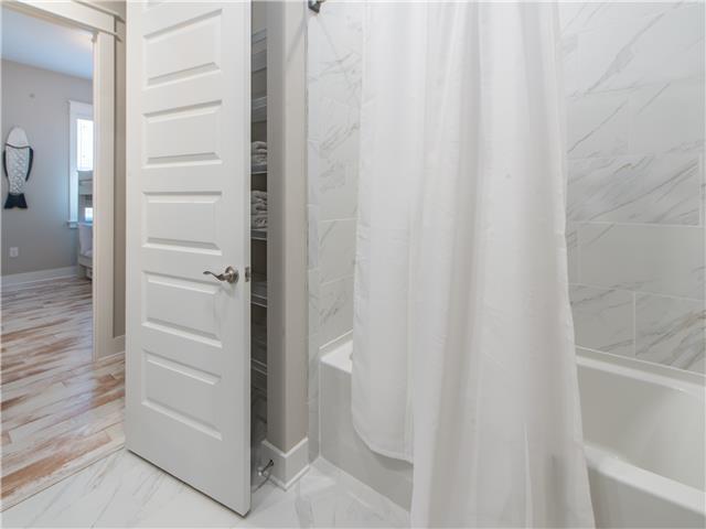 138 East E Pine, Unit A Inlet Beach, FL 32461 - Photo 22 of 48 a bathroom with a shower