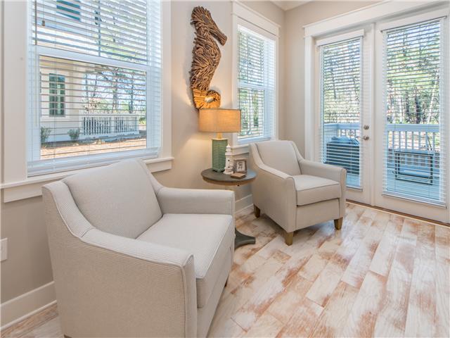138 East E Pine, Unit A Inlet Beach, FL 32461 - Photo 25 of 48 a living room with furniture and a large window