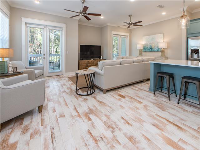 138 East E Pine, Unit A Inlet Beach, FL 32461 - Photo 26 of 48 a living room with furniture and a flat screen tv