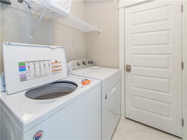 138 East E Pine, Unit A Inlet Beach, FL 32461 - Photo 27 of 48 a utility room with dryer and washer